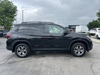 Conquer every adventure with the rugged yet refined 2023 Honda Passport TrailSport, a vehicle engine... (image 3)