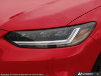 Get behind the wheel of the vibrant red 2027 Honda HR-V Sport AWD, engineered for all-weather condit... (image 6)