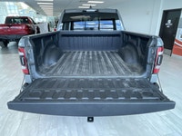 The 2023 Ram 1500 Rebel with the 5.7L HEMI V8 eTorque engine is the perfect blend of off-road capabi... (image 4)