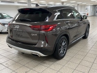 "I didnt expect an SUV to feel this composed and artful," says Maya R., a recent QX50 owner. "Every... (image 5)