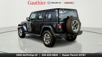 The 2022 Jeep Wrangler Unlimited Sahara is a versatile 4-door SUV that blends classic Jeep off-road... (image 3)