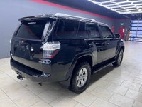 Experience the rugged elegance of the 2016 Toyota 4Runner SR5, presented in a commanding Black finis... (image 8)