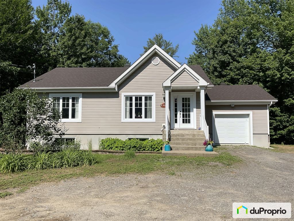$575,000 - Bungalow for sale in Ste-Julienne — photo 1