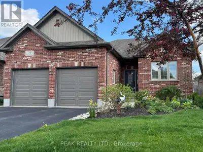 Beautiful and Lovingly maintained Ron Stroh custom built all brick bungalow in a sought after area i...