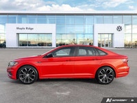 The 2019 Volkswagen Jetta Highline, presented in eye-catching Habanero Orange Metallic with a sophis... (image 1)