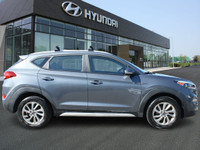 The 2018 Hyundai Tucson Premium FWD is a compact SUV that offers a perfect blend of modern design, a... (image 3)