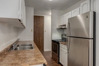 Amenities: Heat & Water Included • Security System • Quiet Buildings Suite & Building: One-bedroom a... (image 4)