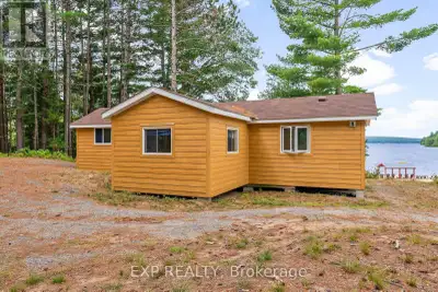 Welcome to 148 Sandy Shores Trail, your dream retreat on the shores of Kamaniskeg Lake! This charmin...