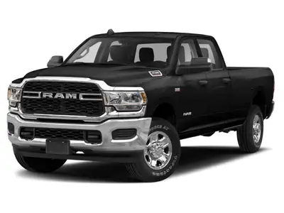 Introducing the powerful and capable 2022 Ram 3500 Laramie 4x4 Crew Cab with an 8' Box, presented in...