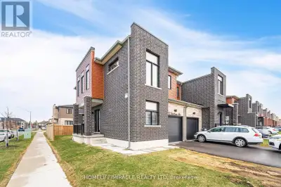 Welcome To This Stunning End-Unit townhome, Ideally Situated On A Premium Corner Lot. Modern And Met...