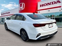 The 2024 Kia Forte EX, finished in striking Snow White Pearl, instantly elevates your daily commute... (image 3)