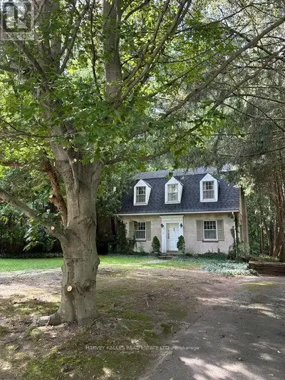 Hogg's Hollow original 1926 charming Centre Hall Character home on private, lushly treed lot. Much l...