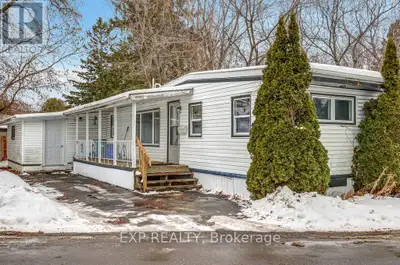 Finally- an opportunity for affordable home ownership in Bellwood Estates. This mobile home on a lan...