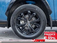 The 2024 Toyota RAV4 Hybrid XSE AWD, dressed in a stunning blue, offers an exceptional all-wheel dri... (image 4)