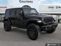 Uncompromising capability meets sophisticated comfort in this 2024 Black Jeep Wrangler Rubicon X Con... (image 7)