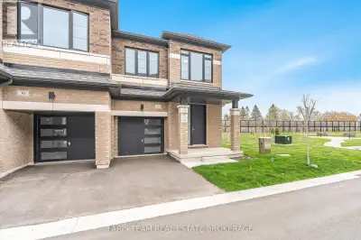 Top 5 Reasons You Will Love This Home: 1) This brand new, turn-key end-unit townhome boasts 9' ceili...