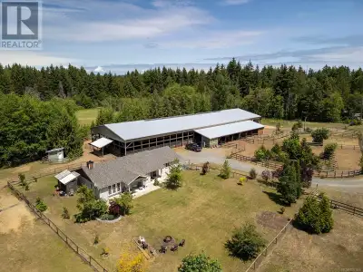 Created with a passion for the true horse lover. This fenced 4.9 acre property Is designed for those...