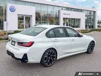This 2025 BMW 3 Series 330i xDrive, stunning in White, unites its robust turbocharged engine with ag... (image 4)