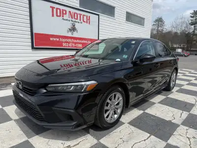 A modern and efficient compact sedan with a refined interior, advanced safety features, and smooth t...