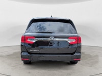 This 2020 Honda Odyssey EX-L finished in a sleek black exterior with a matching black leather interi... (image 7)