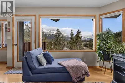 TOP FLOOR 3-BEDROOM with PANORAMIC MOUNTAIN VIEWS -2 PARKING STALLS+ OVERSIZED STORAGE. Newly priced...