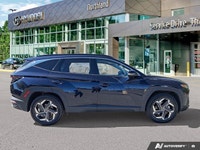 The 2024 Hyundai Tucson Hybrid Luxury, in stunning Deep Sea Blue, represents the pinnacle of modern... (image 5)