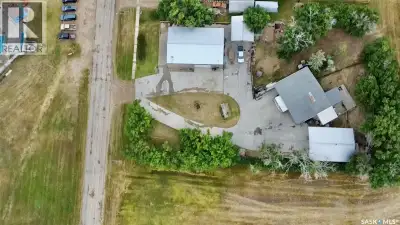 Two homes, a 40' x 60' heated shop and a fully serviced 0.86-acre parcel on the edge of Chaplin make...