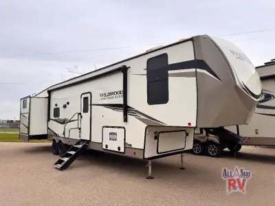 Forest River Wildwood Heritage Glen fifth wheel 356QB highlights: Unique Rear Entry Two Full Bathroo...