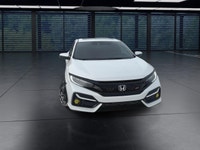 The 2020 Honda Civic Si Sedan in white offers a dynamic driving experience with its FWD drivetrain a... (image 2)