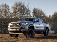 CARGET AUTOMOTIVE is thrilled to offer this 2021 Toyota Tacoma Double Cab, a rugged midsize pickup o... (image 1)