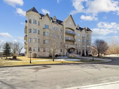 Stunning high-end condo in the heart of a sought-after community! Featuring two bedrooms, a bathroom...