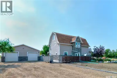 Exceptional in-town acreage on approximately 1.59 acres in Belle Plaine offering the perfect blend o...