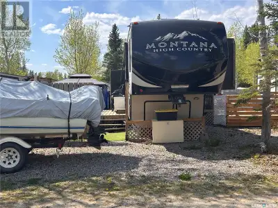 Enjoy lake life with 42ft 2017 Montana High Country 5th Wheel located in Golfer’s Haven RV park. Thi...