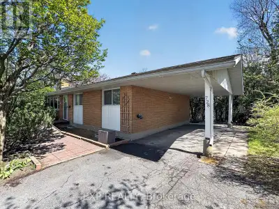 This beautifully updated bungalow with 3 bed IN LAW/RENTAL suite offers incredible flexibility in on...