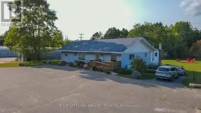 This beautiful, updated bungalow offers 4 bedrooms and 2 bathrooms. If you enjoy entertaining, the e...