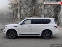 This Nissan Armada has a dependable Gas V-8 5.6L engine powering this Automatic transmission. Sunroo... (image 1)