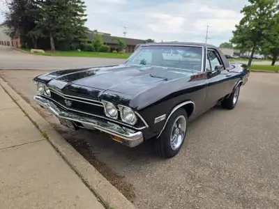 1968 Chevrolet El Camino SS 396. Triple black car with buckets and center console featuring shifter...