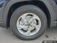 The 2022 Hyundai Tucson in Deep Sea Blue isn't just a vehicle; it's a statement of style and practic... (image 8)