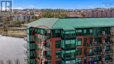 Experience elevated waterfront living in this stunning top-floor corner suite at Dockside Bedford, i...