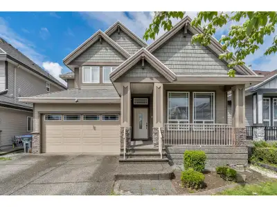 CENTRAL CLOVERDALE LOCATION! Spacious and well-maintained 6 BED + DEN, 4.5 BATH family home with a f...