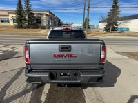 The 2022 GMC Canyon Denali long box is presented as a in.right-sizedin. luxury midsize truck that of... (image 4)