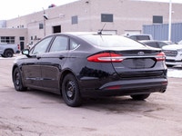 This 2017 Ford Fusion SE is powered by a reliable 2.5L four-cylinder engine paired with a smooth aut... (image 5)