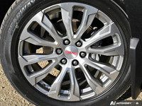 Command the road in this 2022 GMC Yukon XL Denali, a pinnacle of SUV luxury and capability. Boasting... (image 6)