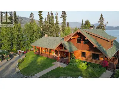 This is truly a rare opportunity to own a stunning log home on 20 Acres- a treed peninsula with pris...