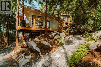 Brand-new waterfront beach house in picturesque Indian Arm! High-end finishes include open-concept d...