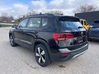 The 2024 Volkswagen Taos Comfortline is a compact SUV that offers a great balance of efficiency, pra... (image 4)