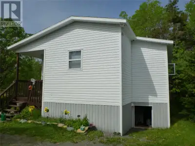 Cozy 2 bedroom bungalow tucked away on a mature lot off a small side street. A great place for a sta...