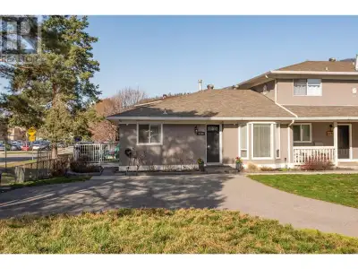 Updated End-Unit Rancher Townhome with Daylight Walk-Out Basement - Immaculate rancher-style 3-bedro...