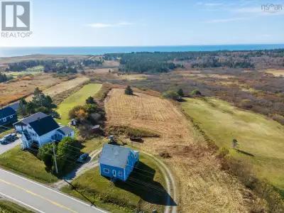 Charming 5-bedroom Acadian Homestead with Ocean Views. Located in the heart of Salmon River, this sp...