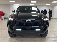 Engineered for drivers who want capability without compromising conscience, this 2025 Toyota Tacoma... (image 7)